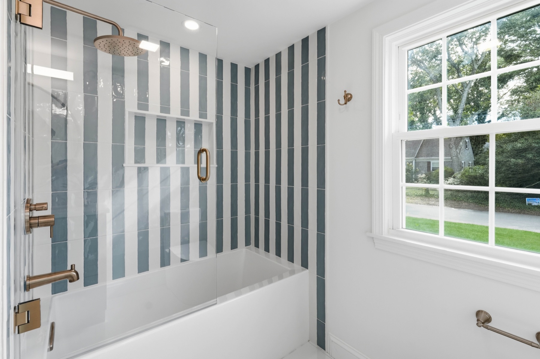 Guest bath with striped blue and white tile